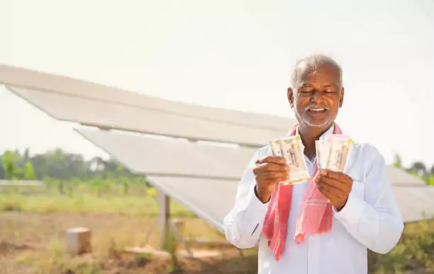 Happy Farmer with Solar Panels